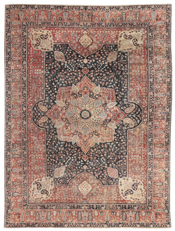 An antique Khoy Tabriz carpet