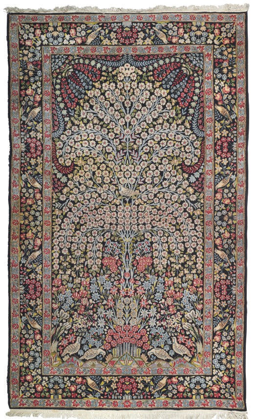 A fine Kirman large prayer rug