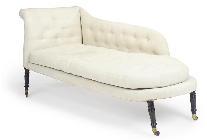 A REGENCY EBONISED CHAISE LONGUE