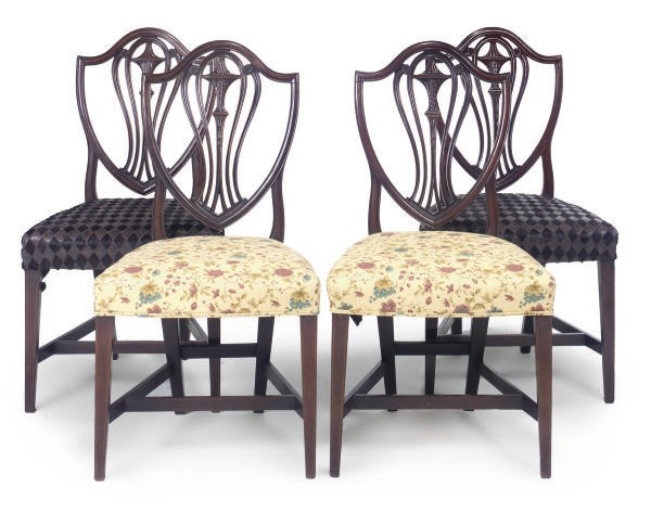 A SET OF FOUR GEORGE III MAHOGANY DINING CHAIRS