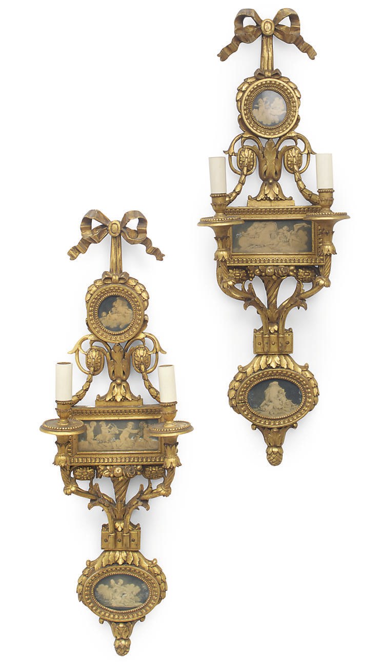 A PAIR OF GILT-WOOD WALL APPLIQUES