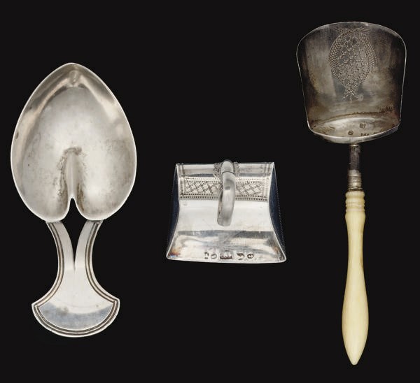 A GROUP OF THREE GEORGE III SILVER CADDY SPOONS