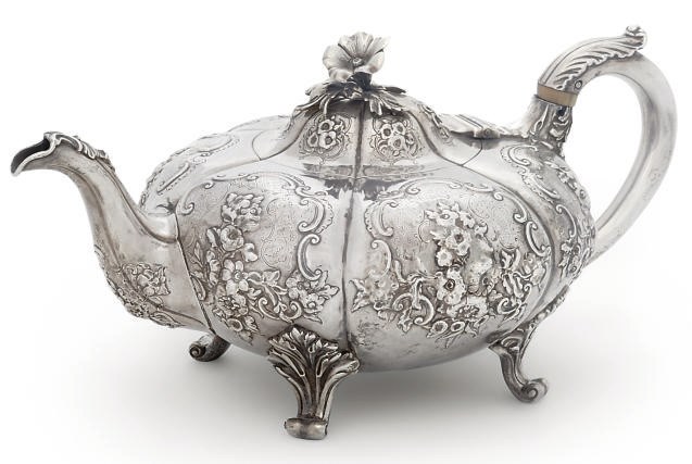 A VICTORIAN SILVER TEAPOT OF COMPRESSED CIRCULAR FORM