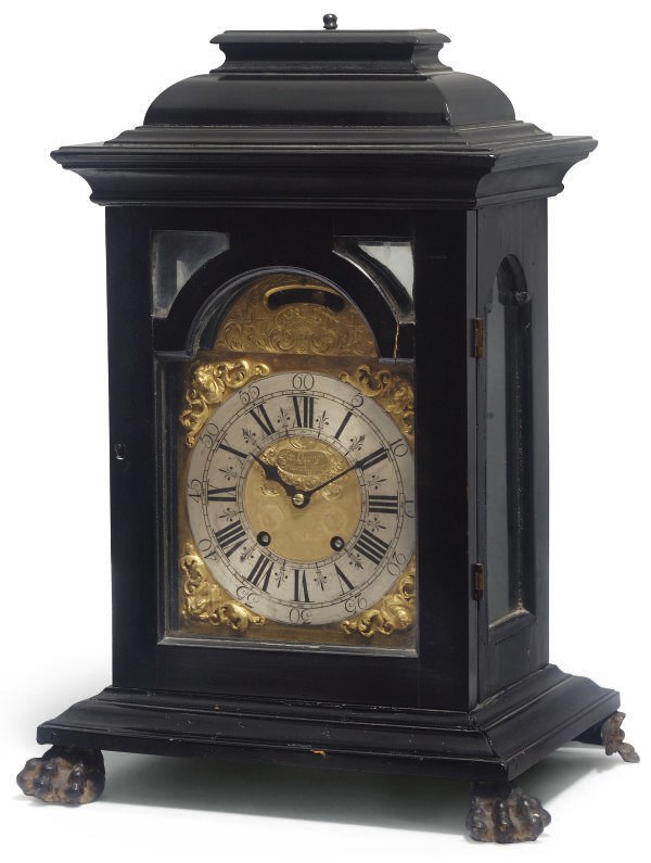 A German ebonised eight day striking table clock