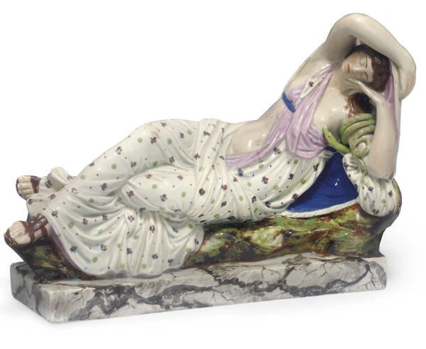 AN ENGLISH PEARLWARE FIGURE OF CLEOPATRA
