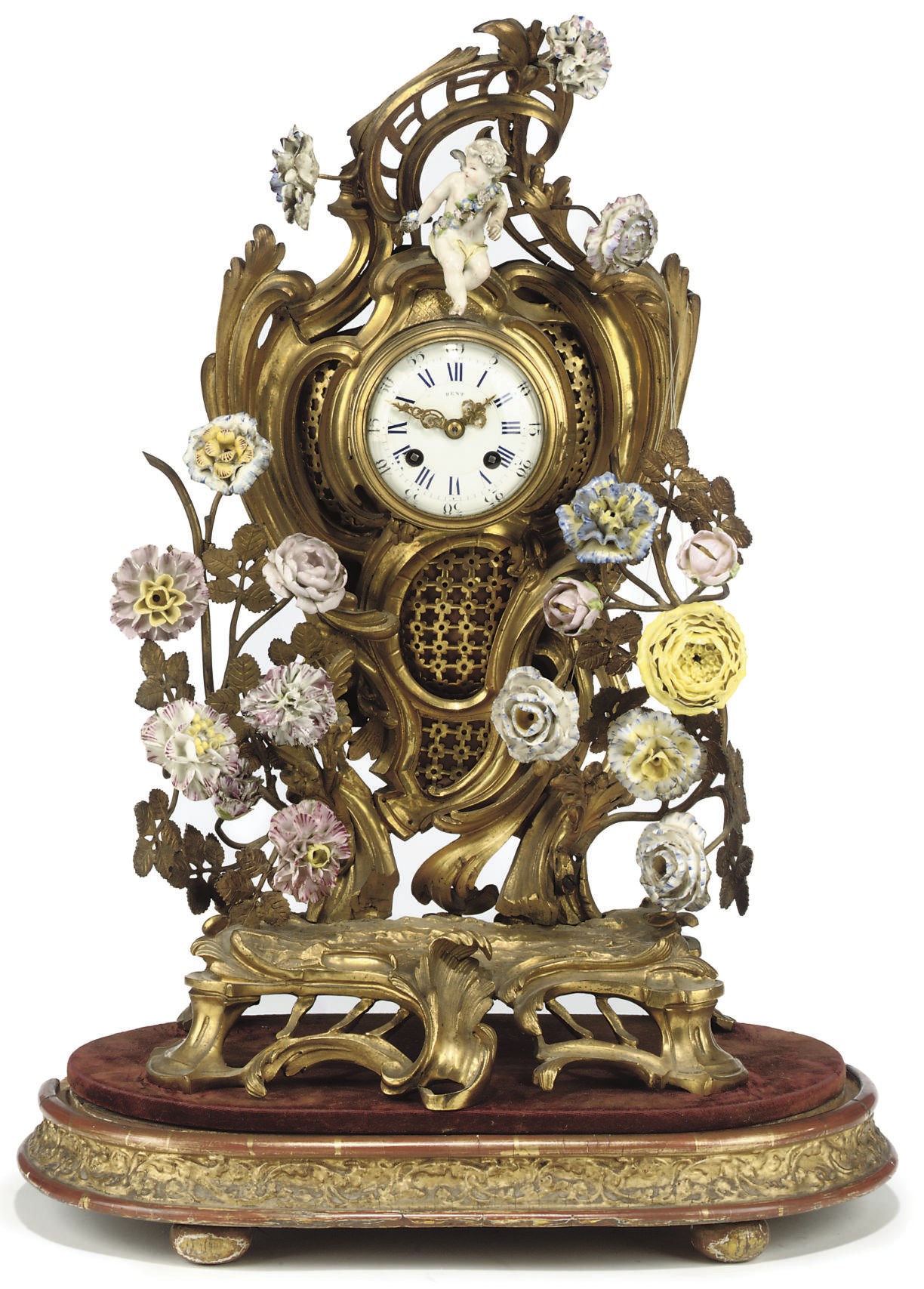 A FRENCH PORCELAIN-MOUNTED ORMOLU MANTEL CLOCK