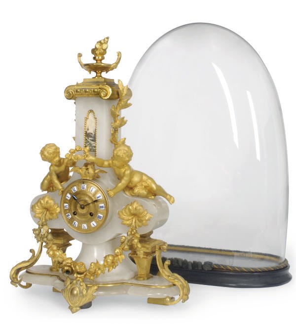 A French gilt-metal mounted striking eight day mantel clock