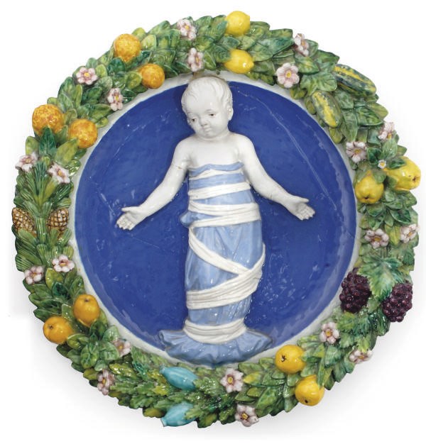 AN ITALIAN DELLA-ROBBIA STYLE PLAQUE