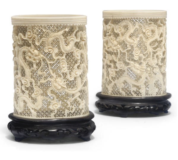 A pair of Chinese ivory brushpots