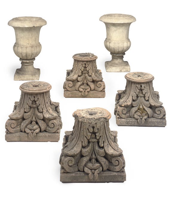 A SET OF FOUR TERRACOTTA CAPITALS