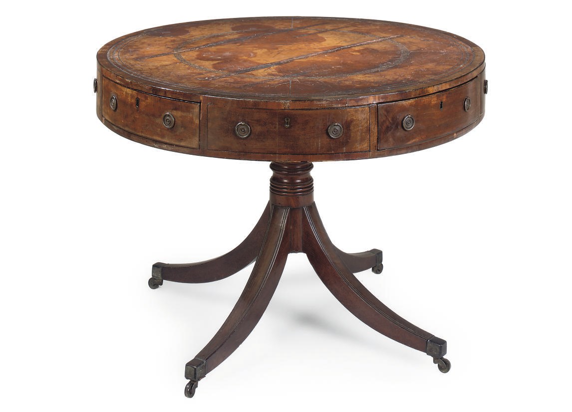 A REGENCY MAHOGANY DRUM TABLE