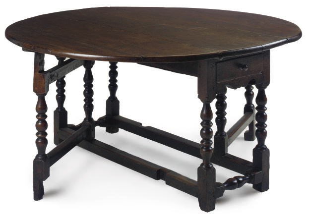 AN OAK GATELEG TABLE