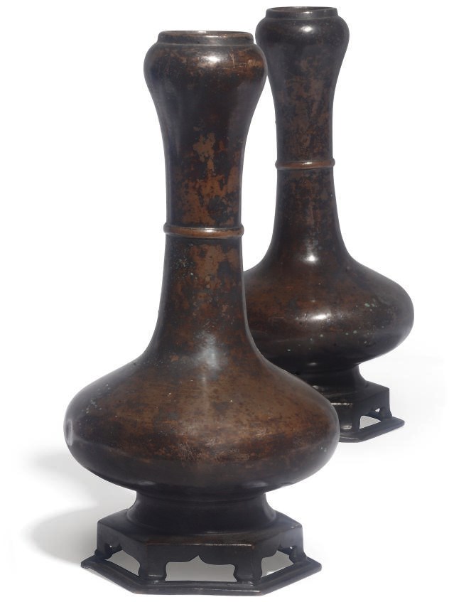 A pair of Chinese bronze garlic necked vases