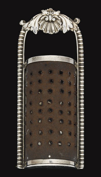 A GEORGE IV SILVER KITCHEN NUTMEG GRATER