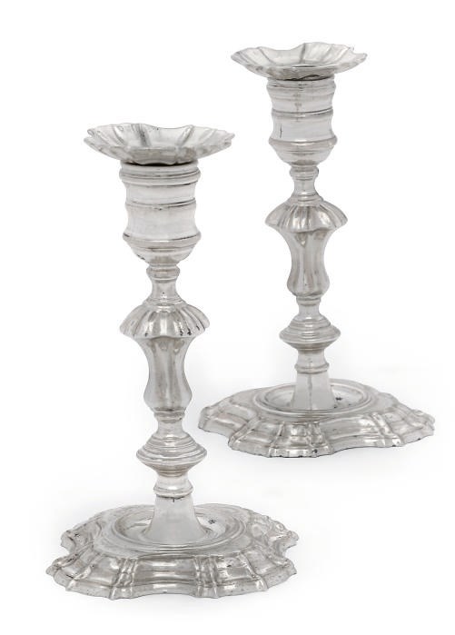 A PAIR OF LATE VICTORIAN CAST SILVER CANDLESTICKS REPRODUCED IN THE GEORGE II/III STYLE