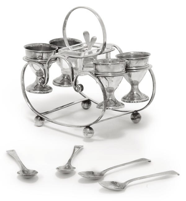 A GEORGE III SILVER FOUR-CUP EGG CRUET