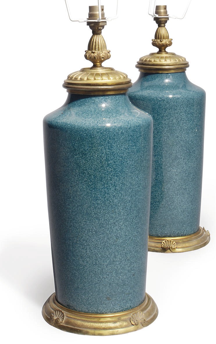 A PAIR OF GREEN-GLAZED PORCELAIN TABLE LAMPS