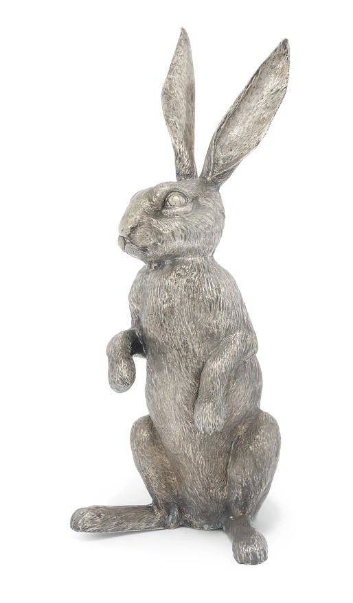 A LARGE CONTINENTAL METALWARE MODEL OF A RABBIT