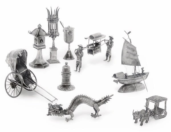 A GROUP OF 13 ENGLISH, CONTINENTAL AND ORIENTAL SILVER TOYS