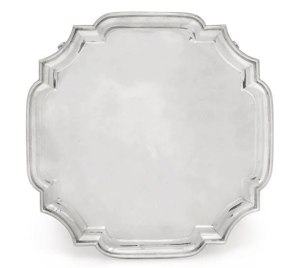 A SILVER SALVER OF SHAPED OCTAGONAL FORM