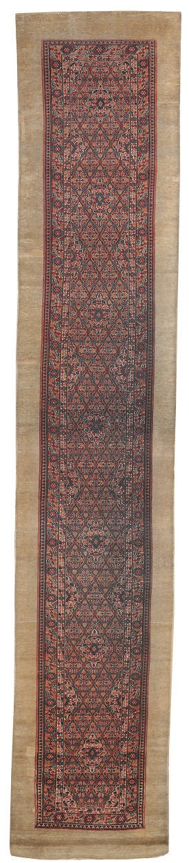 An antique Serapi runner
