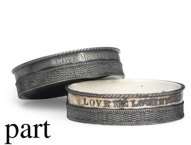 A PAIR OF SILVERED PEWTER DOG BOWLS