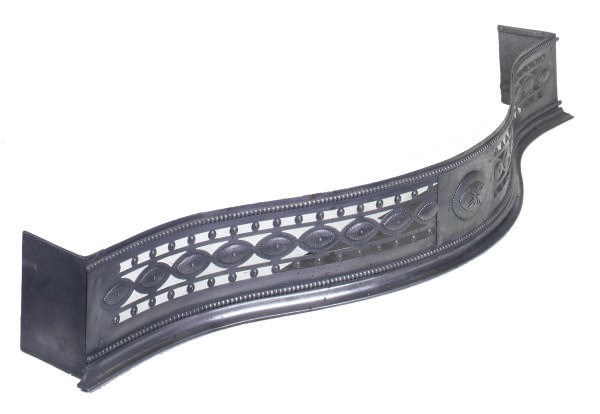 A GEORGE III STEEL SERPENTINE FENDER