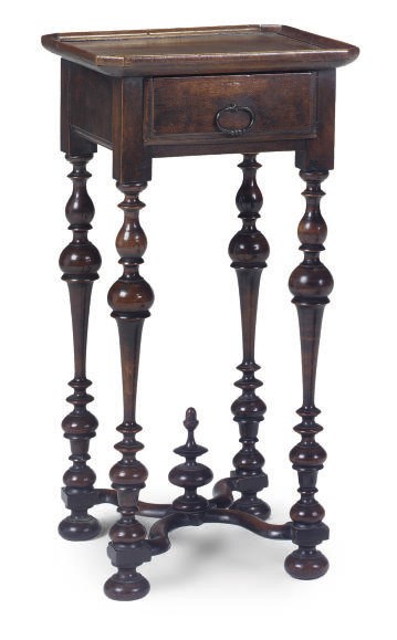 A WALNUT OCCASIONAL TABLE