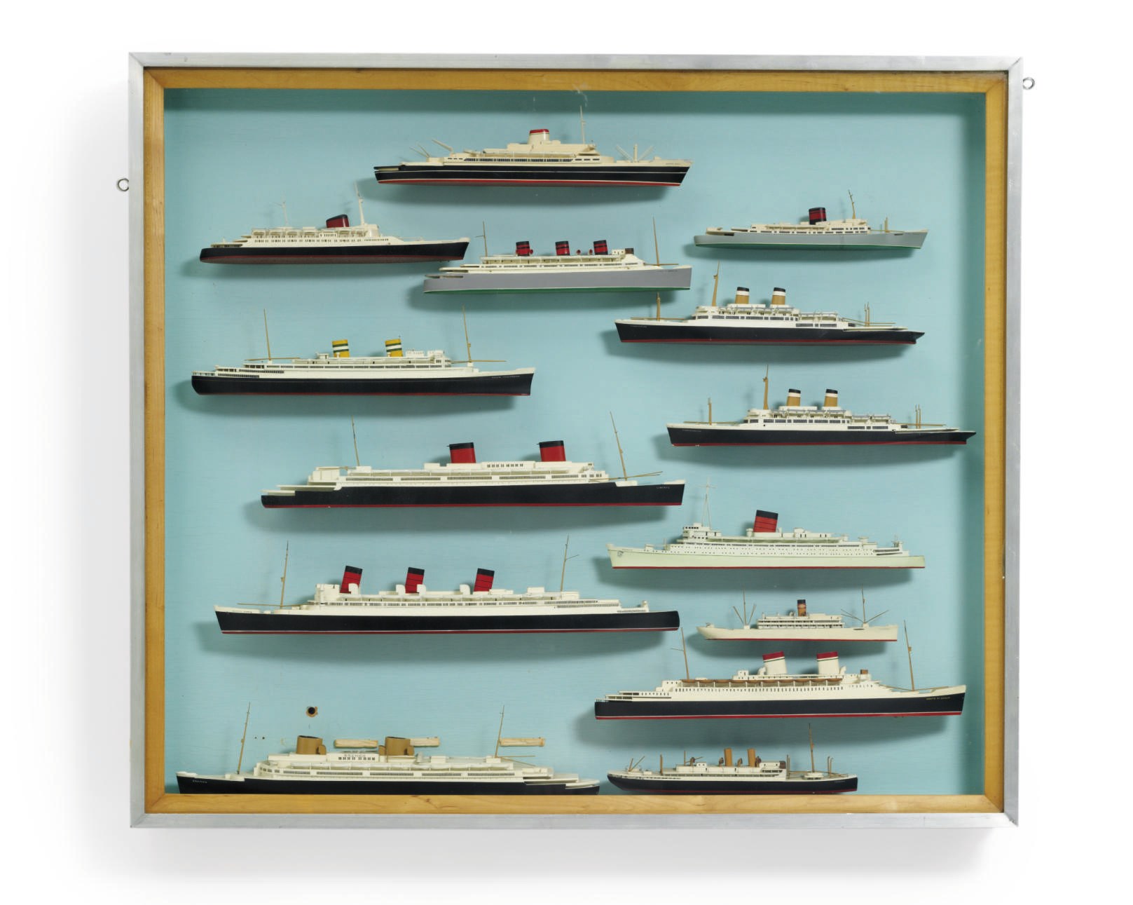 A collection of miniature waterline ocean liner models