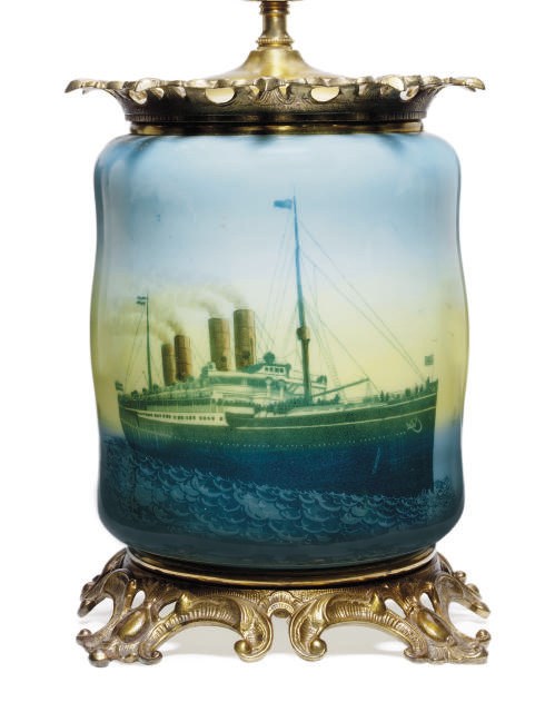 A lamp with a reverse stencil on glass image of the North German lloyd ship S.S. Kaiser Wilhelm der Grosse