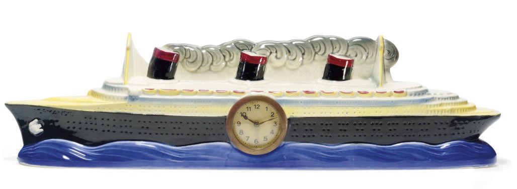 Porcelain model of the S.S. Normandie with an inset clock