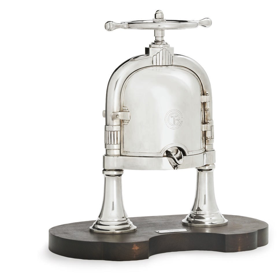 A silver plated duck press for the French Line (CGT