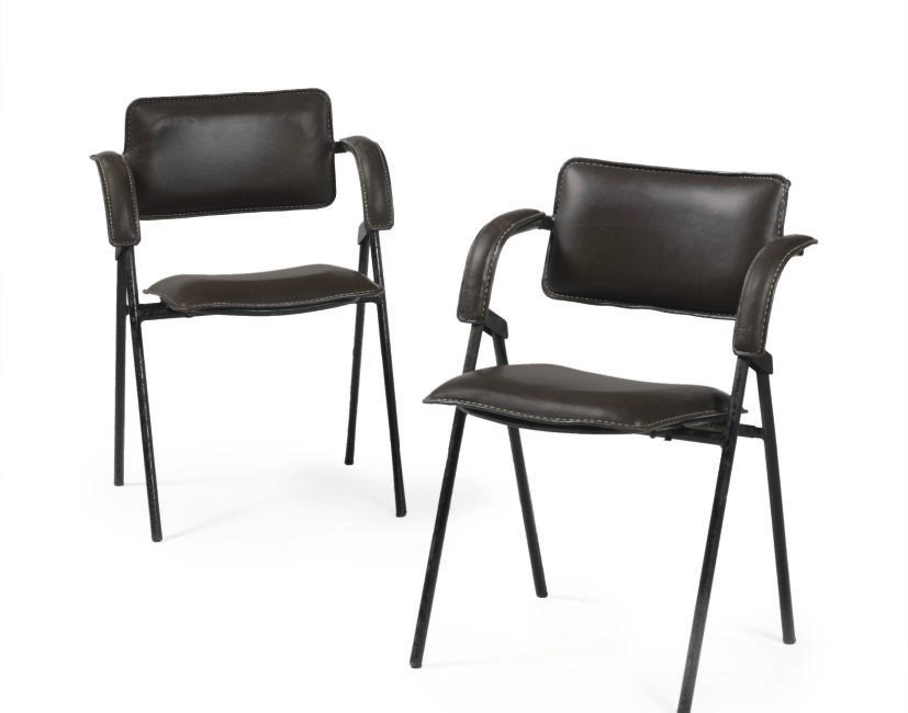 A pair of leather and steel folding chairs for the S.S. France