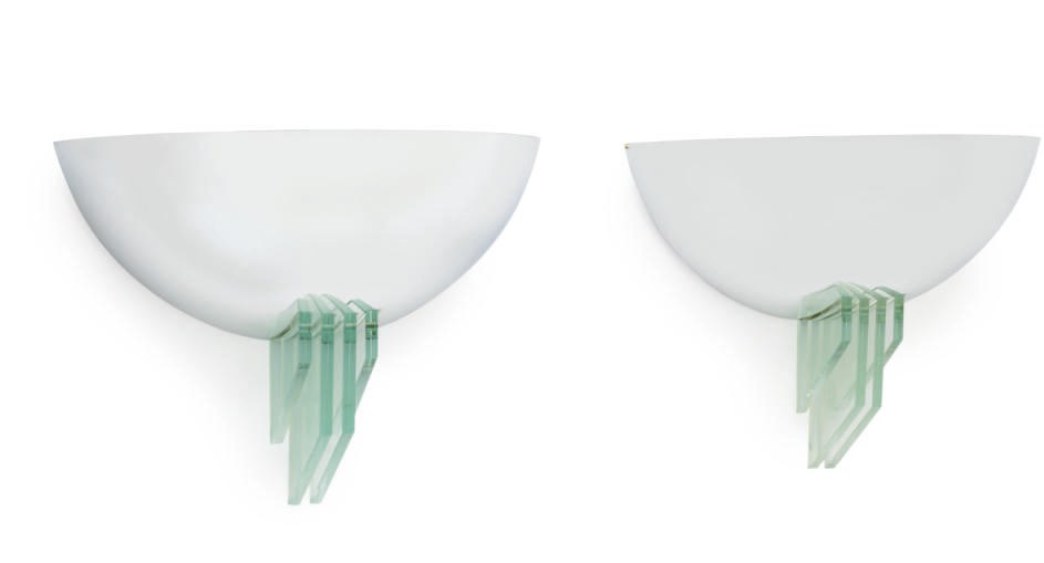 A pair of demi-lune chrome and glass sconces from the suites on board the S.S. Norway