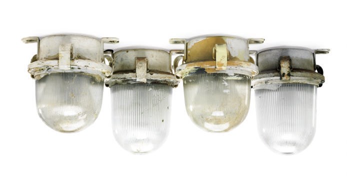 A group of four drop down companion way lights from the exterior areas of the S.S. Norway