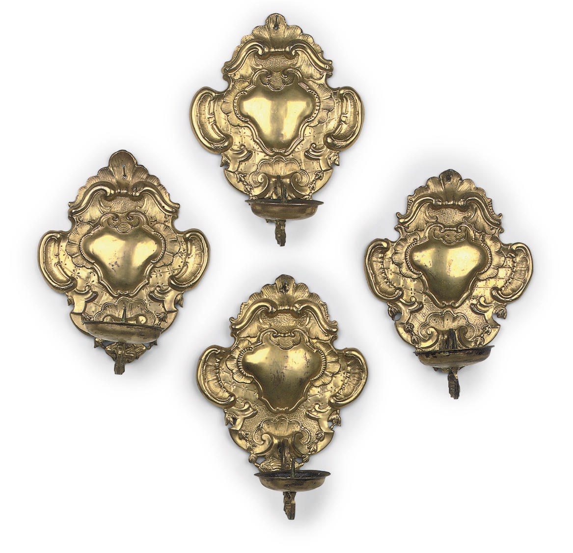 A SET OF FOUR GERMAN GILT-COPPER REPOUSSÉ WALL SCONCES