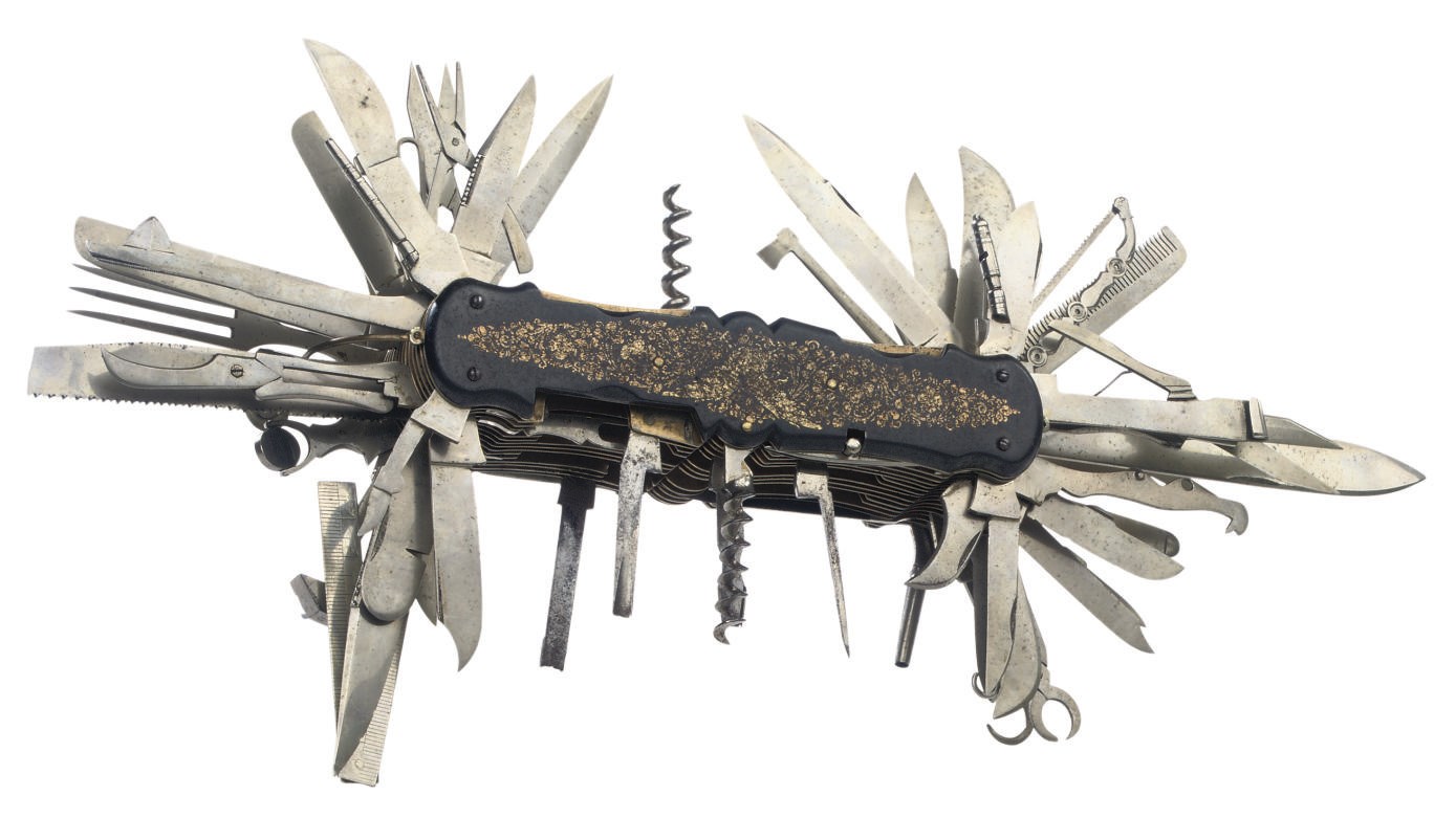 A LARGE MULTI-TOOL COMBINATION POCKET KNIFE