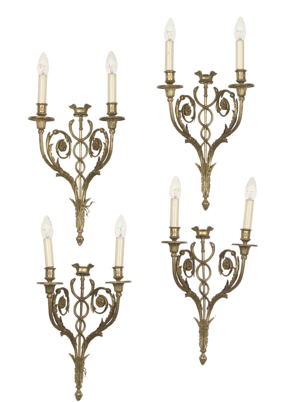A SET OF FOUR NORTH EUROPEAN ORMOLU TWO-LIGHT WALL APPLIQUES