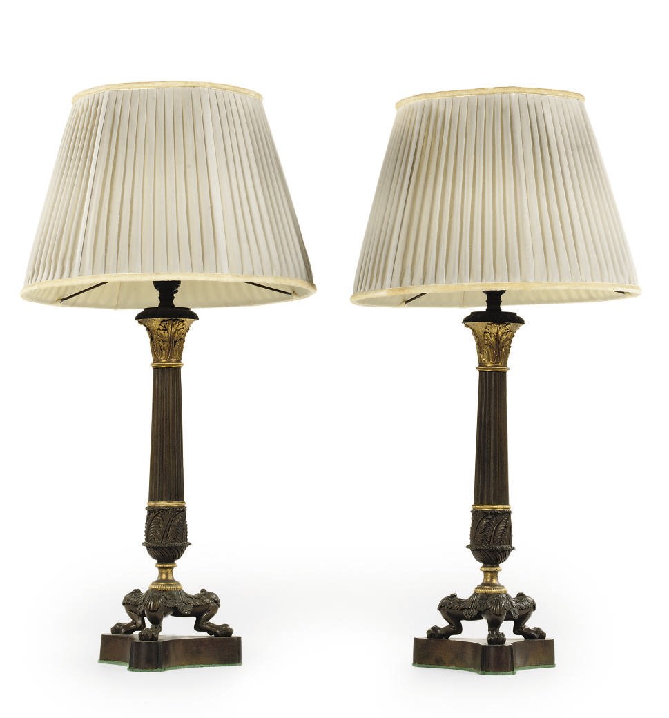 A PAIR OF LOUIS-PHILIPPE ORMOLU AND PATINATED-BRONZE CANDLESTICKS