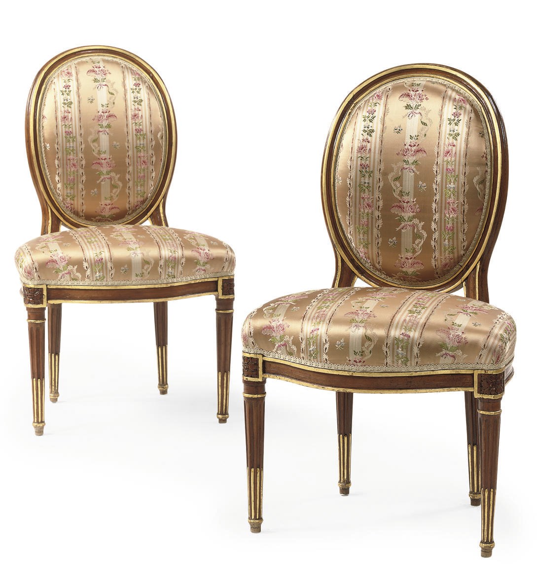 A PAIR OF LOUIS XVI PARCEL-GILT BEECHWOOD SIDECHAIRS