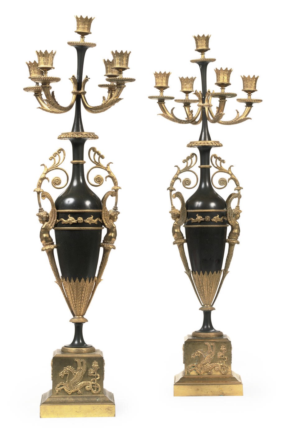 A PAIR OF NORTH EUROPEAN ORMOLU AND PATINATED BRONZE FIVE-LIGHT CANDELABRA