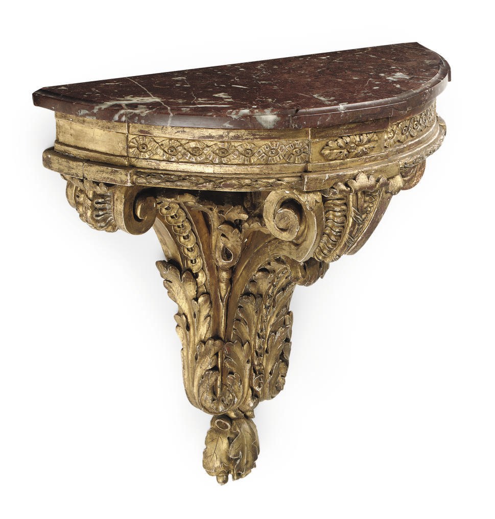 A GERMAN PARCEL-GILT WALL BRACKET