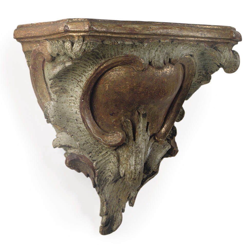 A GERMAN POLYCHROME-DECORATED PARCEL-GILT CARVED LIMEWOOD WALL BRACKET