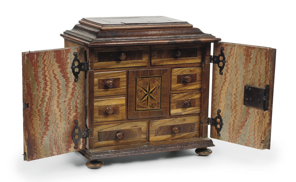 A GERMAN WALNUT, FRUITWOOD AND BOG OAK MINIATURE CABINET