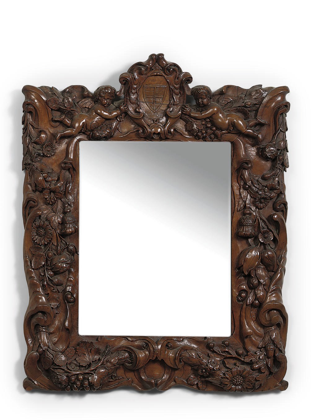 A DUTCH CARVED WALNUT MIRROR