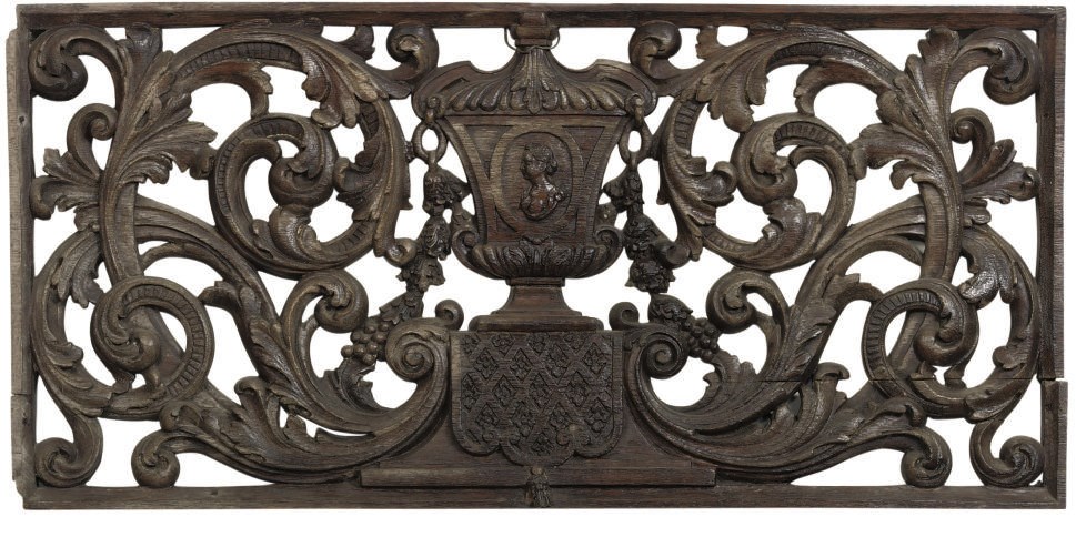 A DUTCH PIERCED AND CARVED OAK OVERDOOR PANEL