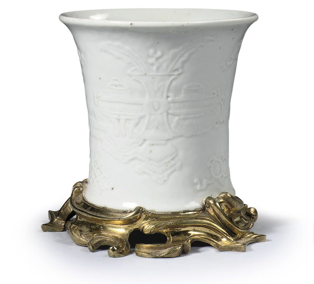 A Chinese blanc-de-chine ormolu-mounted brushpot