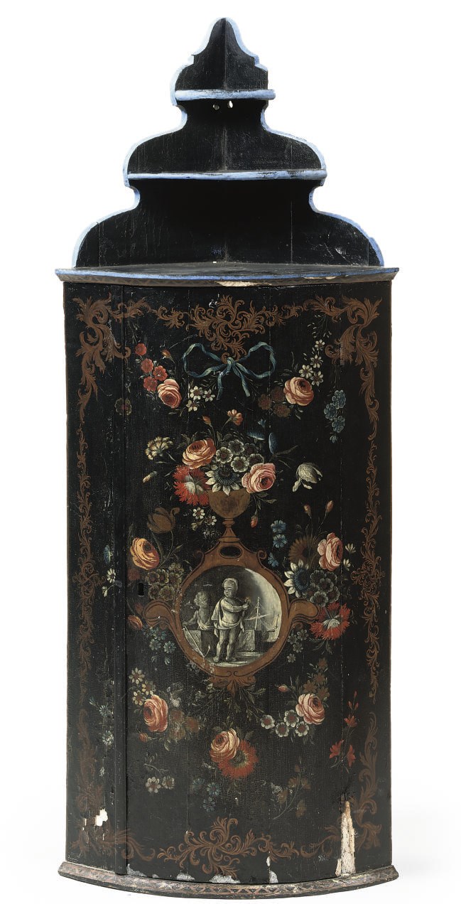 A DUTCH POLYCHROME PAINTED CORNER HANGING CUPBOARD