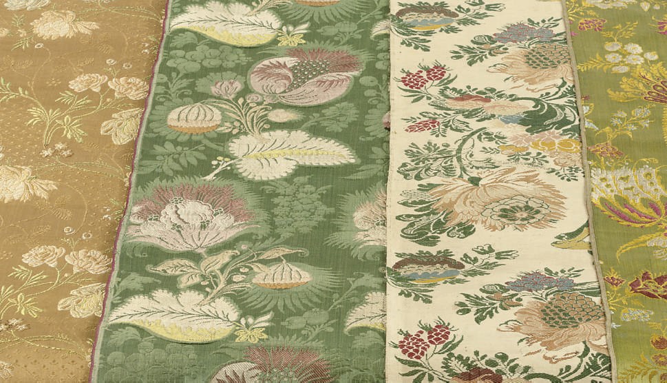 A LOT OF TWELVE SILK TEXTILE FRAGMENTS