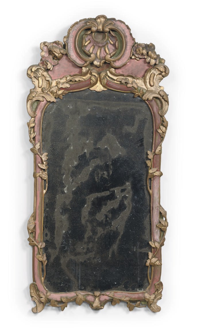 A LOUIS XV RED PAINTED AND PARCEL-GILT MIRROR